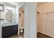 Bathroom with updated vanity and flooring at 909 N Logan St # 4A, Denver, CO 80203