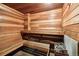 Relaxing wooden sauna with built-in benches and a heater at 909 N Logan St # 4A, Denver, CO 80203