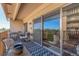 Spacious balcony with seating area and sliding glass doors at 8060 E Girard Ave # 719, Denver, CO 80231