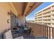 Private balcony with outdoor furniture and mountain views at 8060 E Girard Ave # 719, Denver, CO 80231