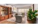 Living room featuring comfy seating and built-in shelving at 8060 E Girard Ave # 719, Denver, CO 80231