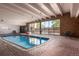 Indoor pool with seating and large windows at 8060 E Girard Ave # 719, Denver, CO 80231