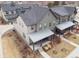 Modern townhome exterior with grey siding and front porch at 11255 E 25Th Ave, Aurora, CO 80010