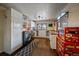 Bright laundry room, washer, dryer, and ample storage at 30162 Pine Crest Dr, Evergreen, CO 80439
