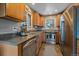 Galley kitchen with stainless steel appliances at 30162 Pine Crest Dr, Evergreen, CO 80439