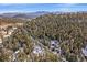 Aerial view showcasing home and mountain views at 30162 Pine Crest Dr, Evergreen, CO 80439