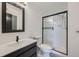 Updated bathroom with a walk-in shower and modern vanity at 1777 S Pitkin St # B, Aurora, CO 80017