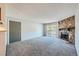 Living room with fireplace and sliding glass door at 1777 S Pitkin St # B, Aurora, CO 80017