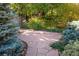 Stone pathway through a landscaped backyard at 808 S Josephine St, Denver, CO 80209