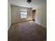 Well-lit bedroom with neutral walls and carpeted floor at 15626 Greenstone Cir, Parker, CO 80134