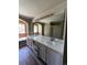 Primary bathroom with double vanity and separate shower at 15626 Greenstone Cir, Parker, CO 80134