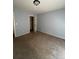 Spacious bedroom with neutral walls and carpet, including a closet at 15626 Greenstone Cir, Parker, CO 80134