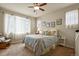 Spacious main bedroom with ceiling fan and ample natural light at 22960 E Roxbury Dr # G, Aurora, CO 80016
