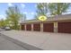 Attached garage with four garage doors and ample parking space at 22960 E Roxbury Dr # G, Aurora, CO 80016