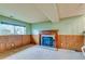 Cozy basement Gathering room featuring a wood-burning fireplace at 19978 E Bates Ave, Aurora, CO 80013