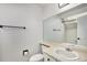 Clean bathroom with a single sink and a large mirror at 8701 Huron St # 1-210, Thornton, CO 80260