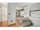 Bedroom with access to the bathroom and living room at 8701 Huron St # 1-210, Thornton, CO 80260