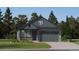 Two-story craftsman style home with gray siding, stone accents, and a two-car garage at 5114 N Quemoy St, Aurora, CO 80019