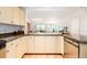 Open concept kitchen with granite countertops and stainless steel appliances at 1560 Blake St # 810, Denver, CO 80202