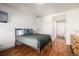 Comfortable bedroom with hardwood floors and access to closets at 1560 Blake St # 810, Denver, CO 80202