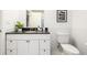 Clean bathroom with white tile, granite vanity, and a shower at 1560 Blake St # 810, Denver, CO 80202
