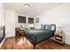 Bright bedroom with hardwood floors and built-in fireplace at 1560 Blake St # 810, Denver, CO 80202