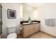 Bathroom with double vanity, large mirror, and shower at 1560 Blake St # 810, Denver, CO 80202