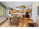 Eat-in kitchen with oak cabinets and an island at 306 Andrea Cir, Parker, CO 80138