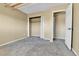 Spacious bedroom with a large closet and carpet at 17769 E Iowa Dr, Aurora, CO 80017