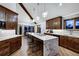 Modern kitchen with marble island, stainless steel appliances, and dark wood cabinetry at 141 Shekel Ln, Breckenridge, CO 80424
