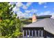Mountain view home with a large deck and stone fireplace at 141 Shekel Ln, Breckenridge, CO 80424
