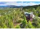 Luxury home nestled in a mountainside community with stunning views at 141 Shekel Ln, Breckenridge, CO 80424
