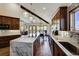 Gourmet kitchen with large island, stainless steel appliances, and wood cabinets at 141 Shekel Ln, Breckenridge, CO 80424