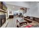 Spacious living area featuring a fireplace, spiral staircase, and leather couches at 141 Shekel Ln, Breckenridge, CO 80424