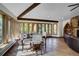 Charming dining area with wood floors and a view of the surrounding landscape at 141 Shekel Ln, Breckenridge, CO 80424