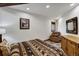 Comfortable bedroom with a rustic bed and relaxing sitting area at 141 Shekel Ln, Breckenridge, CO 80424