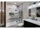 Updated bathroom with a tub shower combo and marble vanity at 141 Shekel Ln, Breckenridge, CO 80424