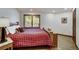 Cozy bedroom with a king-size bed and rustic wooden furniture at 141 Shekel Ln, Breckenridge, CO 80424