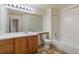 Bathroom with single vanity, toilet and bathtub at 7353 Norfolk Pl, Castle Pines, CO 80108
