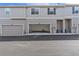 Attached garage with additional storage space at 7353 Norfolk Pl, Castle Pines, CO 80108
