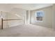 Bright loft area with carpet and window at 7353 Norfolk Pl, Castle Pines, CO 80108