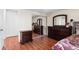 Bedroom with double dresser and mirrored closet doors at 15768 E Center Pl, Aurora, CO 80017