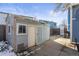 View of a detached shed in need of some repairs at 15768 E Center Pl, Aurora, CO 80017