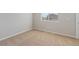 Spacious bedroom with neutral walls and carpet at 7203 Dolores Ave, Frederick, CO 80530