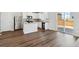 Spacious kitchen with island and access to backyard at 7203 Dolores Ave, Frederick, CO 80530