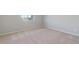 Spacious bedroom with carpet and a view at 7203 Dolores Ave, Frederick, CO 80530