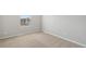 Bright bedroom with neutral walls and carpet at 7203 Dolores Ave, Frederick, CO 80530
