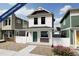 New construction home with white siding, grey accents and landscaping at 12946 E 103Rd Ave, Commerce City, CO 80022