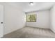 Bright bedroom featuring a window with a tree view at 5122 Williams Fork Trl # 201, Boulder, CO 80301