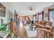 Spacious living room with hardwood floors and a fireplace at 18000 E 100Th Ave, Commerce City, CO 80022